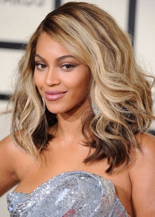 Beyonce Knowles Weave Hairstyle: Mid-length, beachy waves