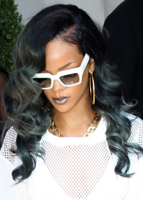 LONDON, ENGLAND - JULY 18:  Rihanna seen leaving her hotel to go to her Birmingham gig on July 18, 2013 in London, England.  (Photo by Neil Mockford/FilmMagic)